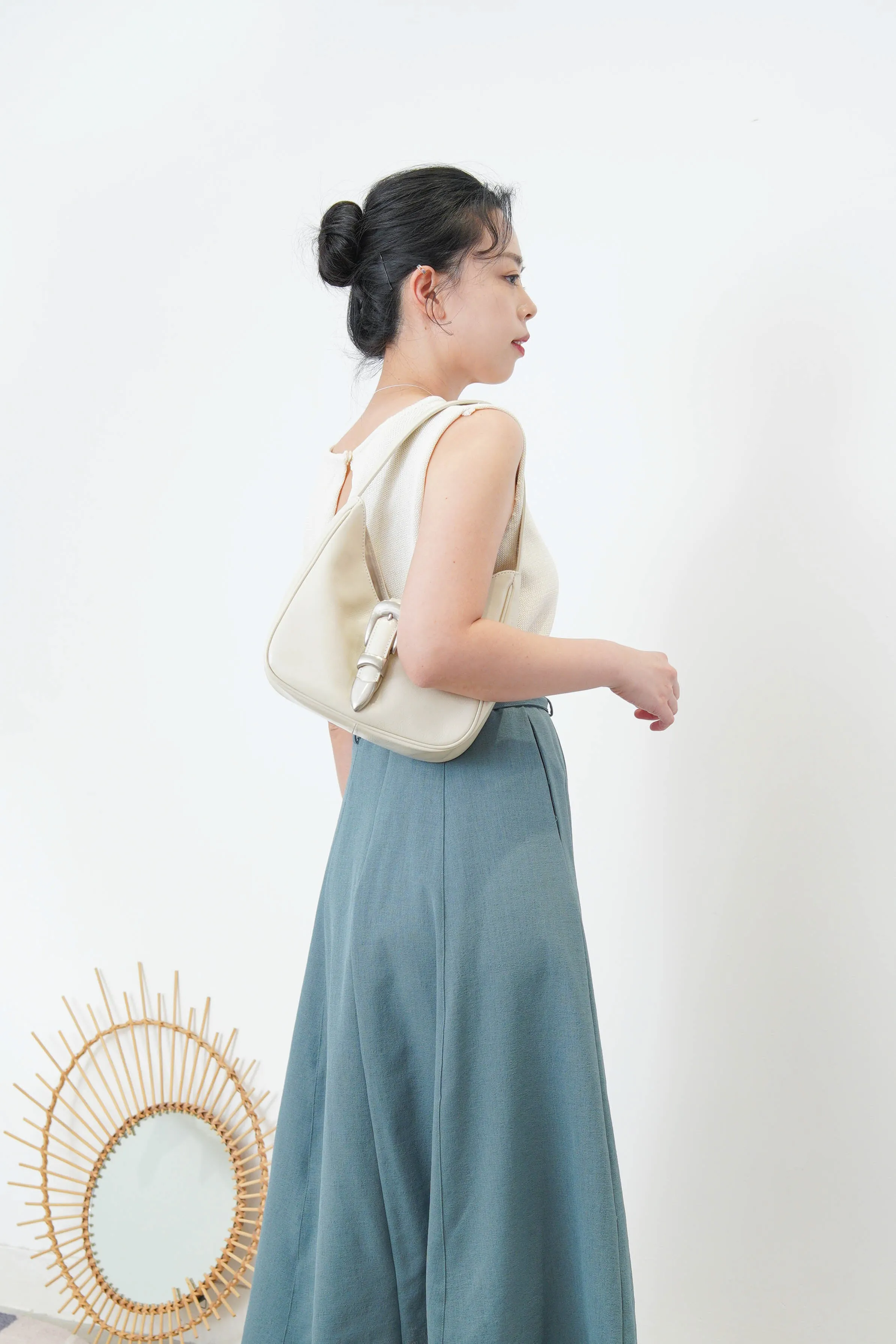 Ivory knit vest in pleats open back